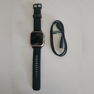 NWOT Garmin Smartwatch in Black with Gold Trim